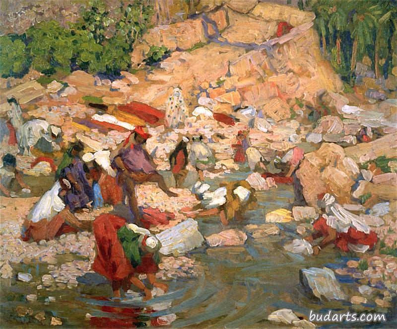 阿拉伯妇女在河里洗衣服