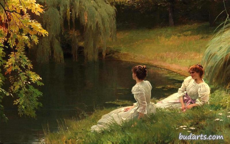 优雅的女士在池塘边休息