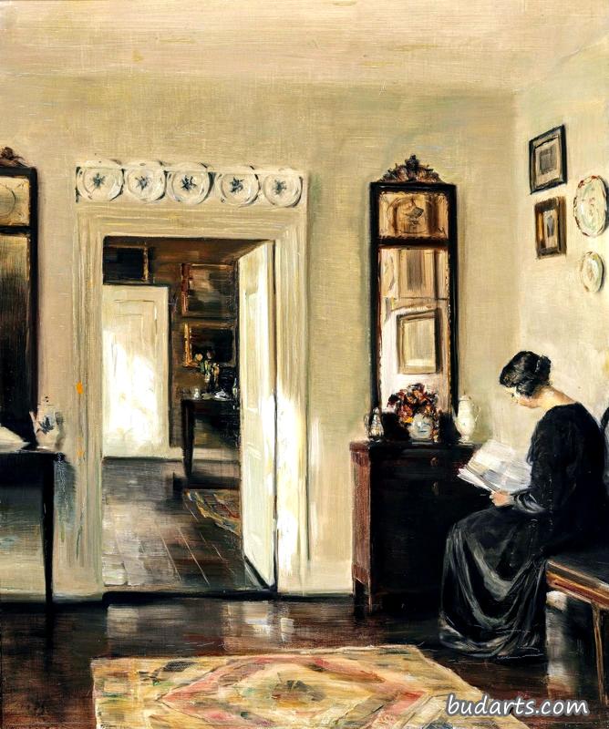 室内，画家的妻子在看书