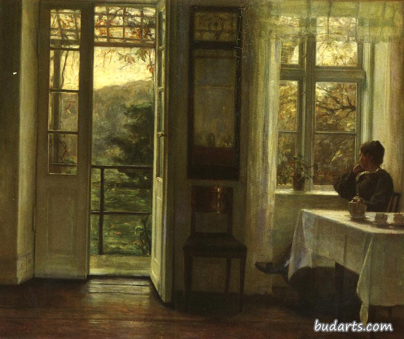 艺术家的妻子坐在阳光充足的房间里的窗户旁