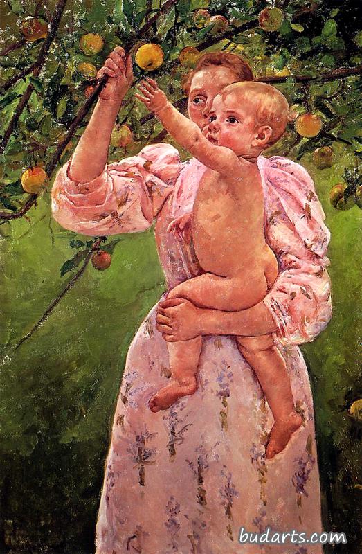 婴儿伸手去摘苹果
