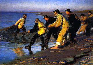 在斯卡根北部海滩上拖网的渔民
