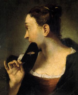 一位戴面具的年轻女子的侧面肖像