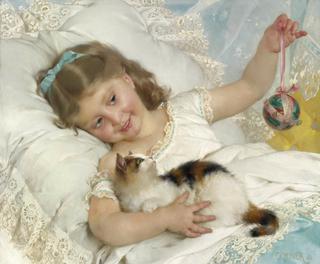 A girl playing with kitten