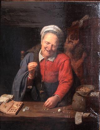 Woman weighting gold