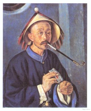 Chinese Man Smoking a Pipe
