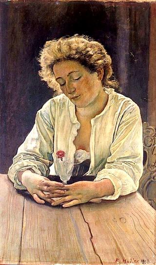 Young woman with carnation