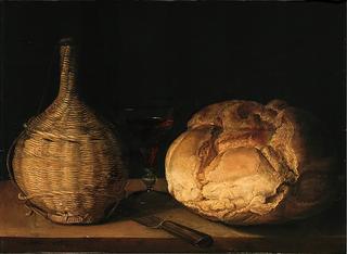Carafe and loaf of bread