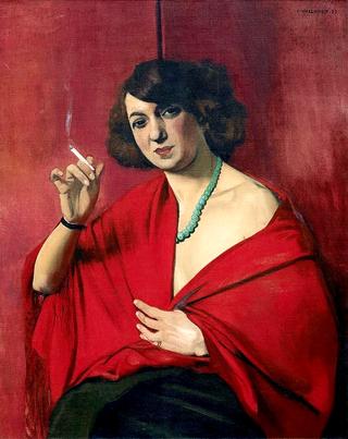 Woman draped in red holding a cigarette