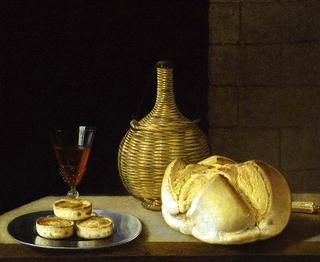 A flagon of wine, a wine glass, a loaf of bread, a knife and pies on a plate