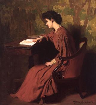 Woman Reading at a Desk