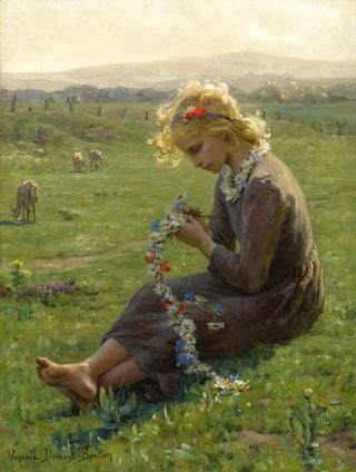 Girl making a flower garland in the fields