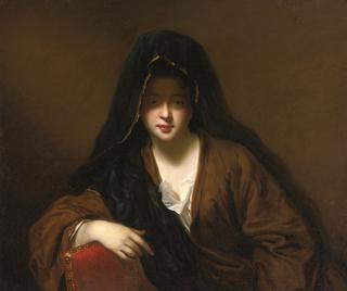 Young woman wearing a shawl