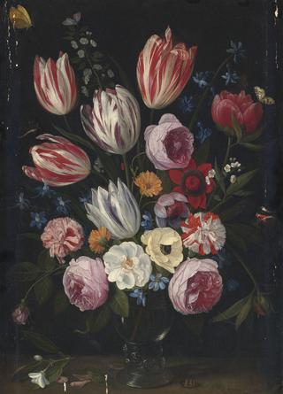 Tulips, roses, peonies and other flowers in a roemer