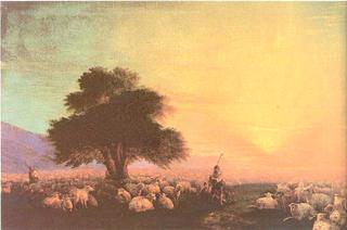 Flock of sheep with herdsmen, sunset