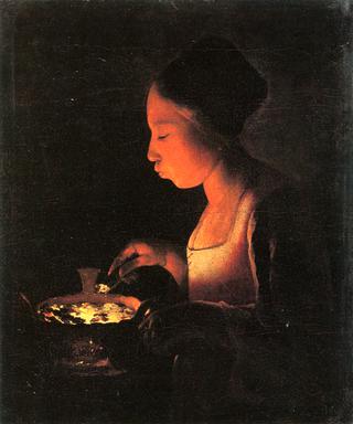 A Girl Blowing on a Brazier
