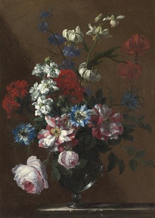 Bouquet of Flowers in Glass Vase on a Marble Ledge