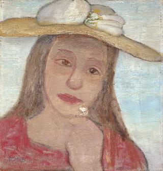 Young Girl With Straw Hat And A Flower In Her Hand