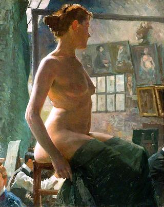 朱利安的工作室里坐着一个裸体的女人