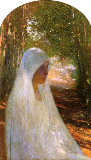 Jeune femme voilée de blanc dans une forêt