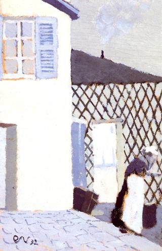 Woman in a White Apron in the Yard