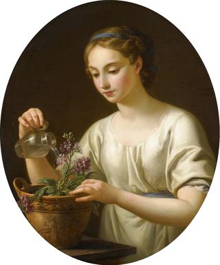 A Young Woman Watering a Pot of Flowers