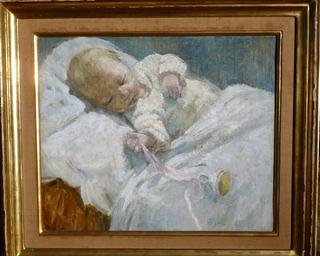 A Baby in a Cot