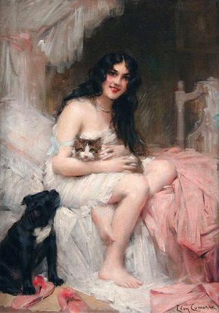 Beauty in Bed with Kitten and Black Dog