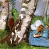 娃娃坐在桦树树干上的孩子