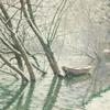 雪下河流小船