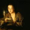 烛光下看书的女孩