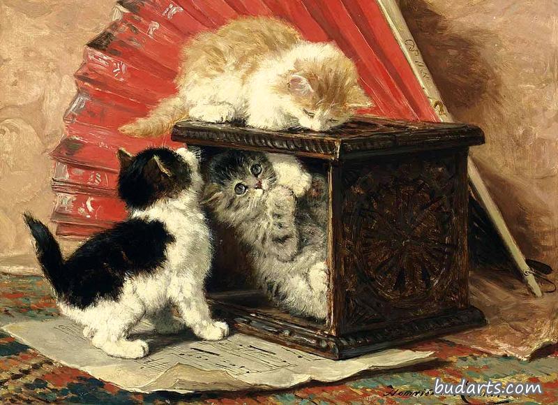三只小猫在炉边玩耍