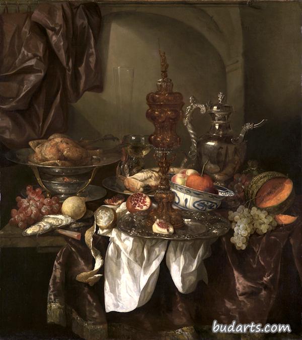 Still life with fruit, roast, silver- and glassware, porcelain and columbine cup on a dark tablecloth with white serviette. Still life with fruit, roast, silver- and glassware, porcelain and columbine cup on a dark tablecloth with white serviette.