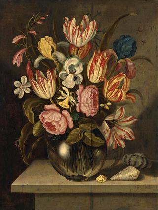 A Still Life of Tulips, Roses, Irises and Daffodils in a Glass Vase