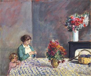 Woman and child seated at a table