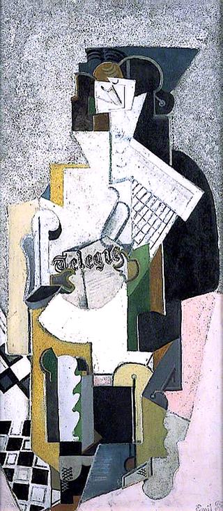 Man sitting holding a newspaper