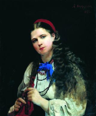 A Girl Braiding a Plait