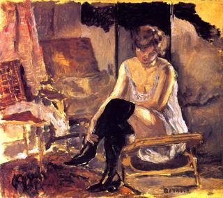 Young Woman Seated on a Chaise Lounge