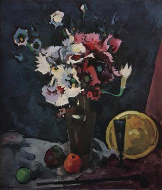White and Pink Flowers with a Blue Glass