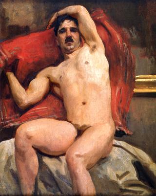A Male Model, Seated, Red Cushion Background