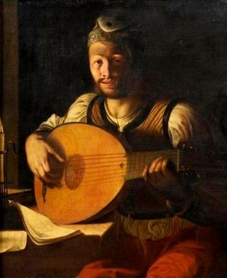 A Young man playing a lute by candlelight
