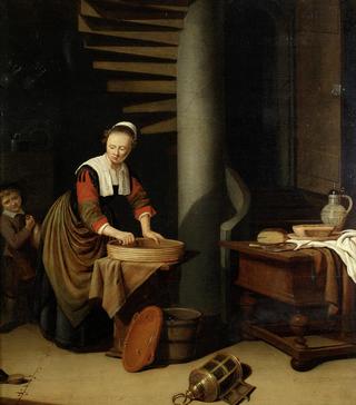 A kitchenmaid ironing