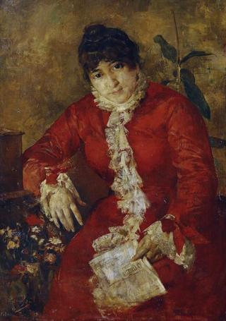 Woman in red dress with a newspaper