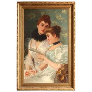 Two young ladies reading a book