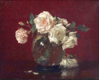 Pink and white roses in a glass vase