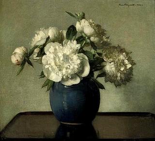 White peonies in a blue earthenware vase