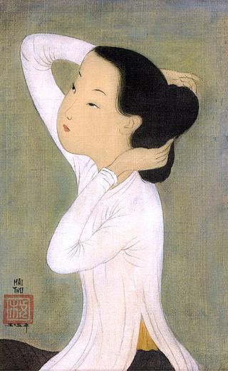 Woman Styling Her Hair