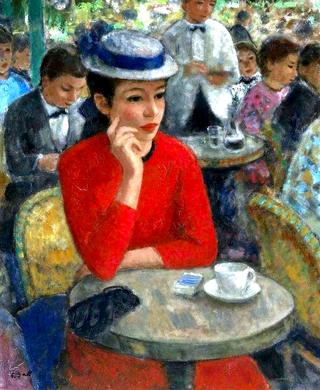 Girl in red in a cafe