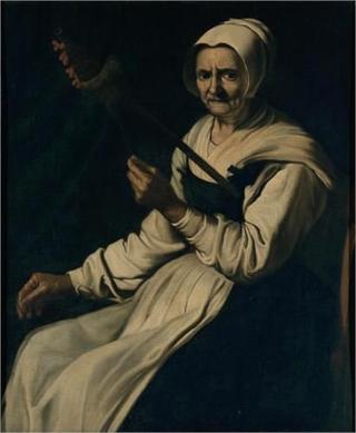 Old woman spinning