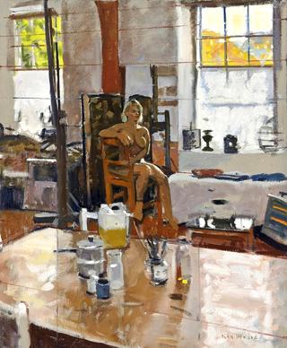 Seated nude in a studio